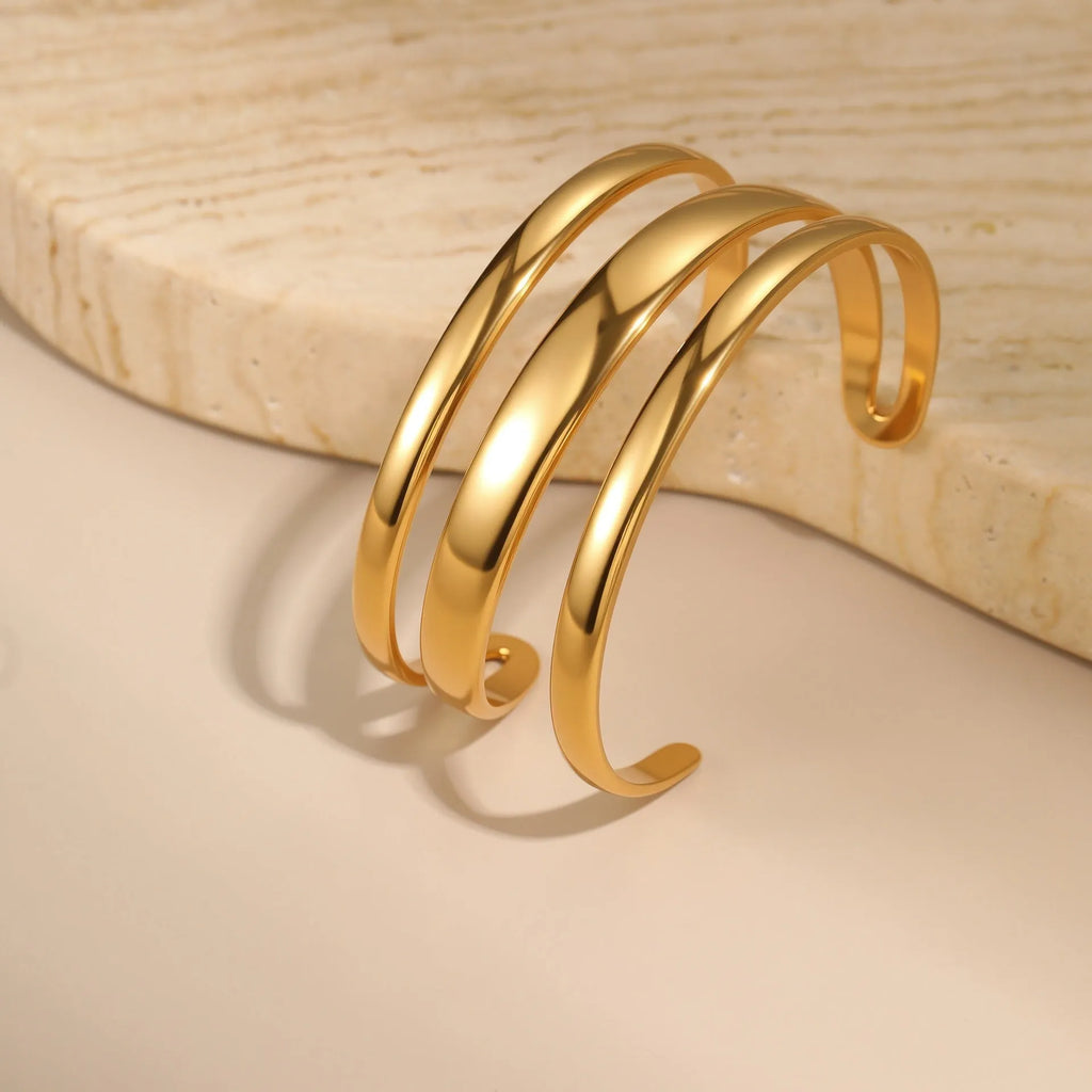 Women's geometric stainless steel bracelet with 18K gold electroplating in simple opening design