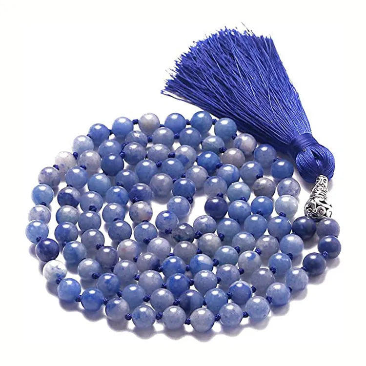 Long multi-strand agate tassel necklace with geometric pattern of amethyst, lapis lazuli, and blue stone beads.