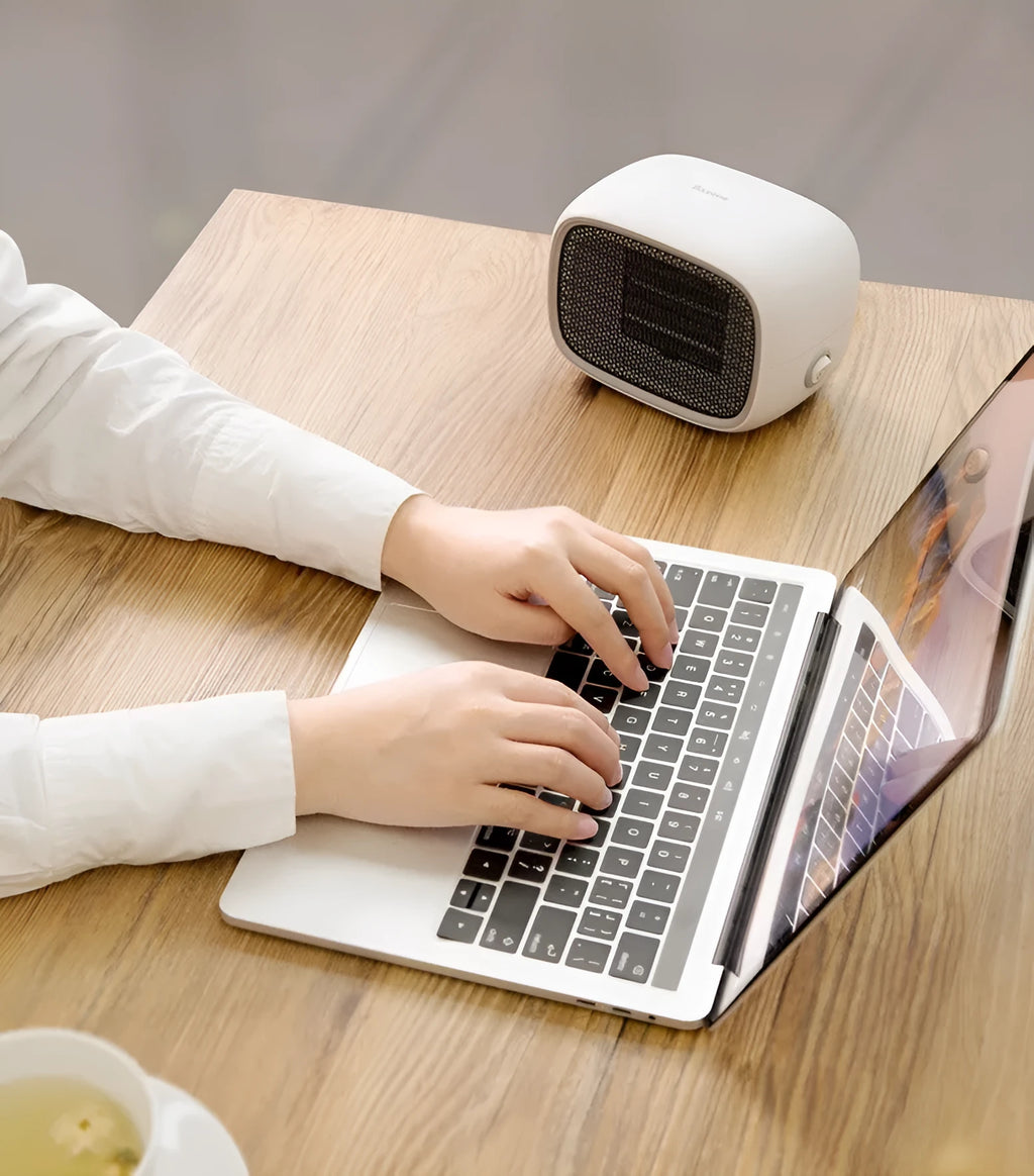Green mini ceramic heater with compact design showing dimensions and ventilation grille
