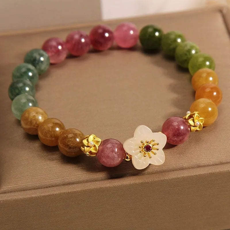Natural colour tourmaline bracelet showing floral design option with electroplated silver finish