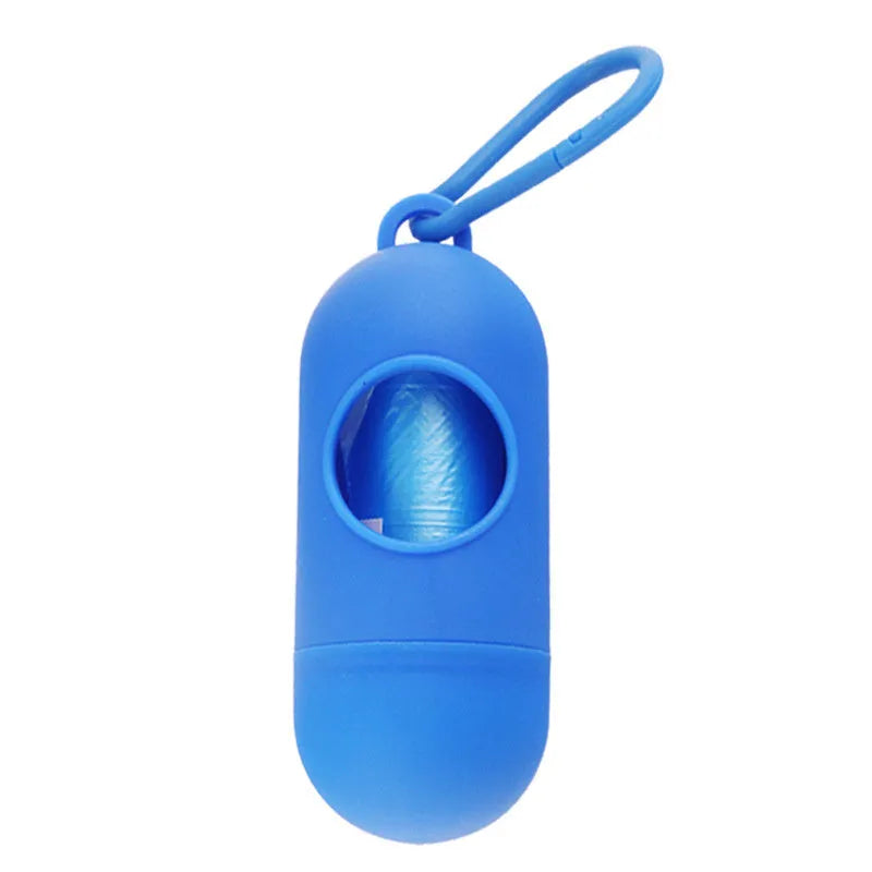 Compact black dog waste bag holder with side hook and velcro base for attaching to trousers or dog collars