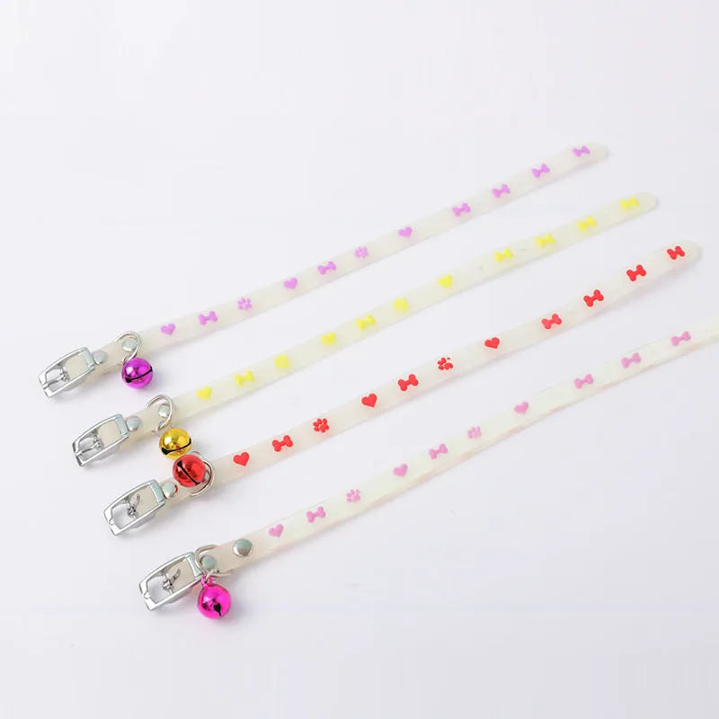 Luminous cat collar with adjustable silicone chain and metal bell in paw print pattern