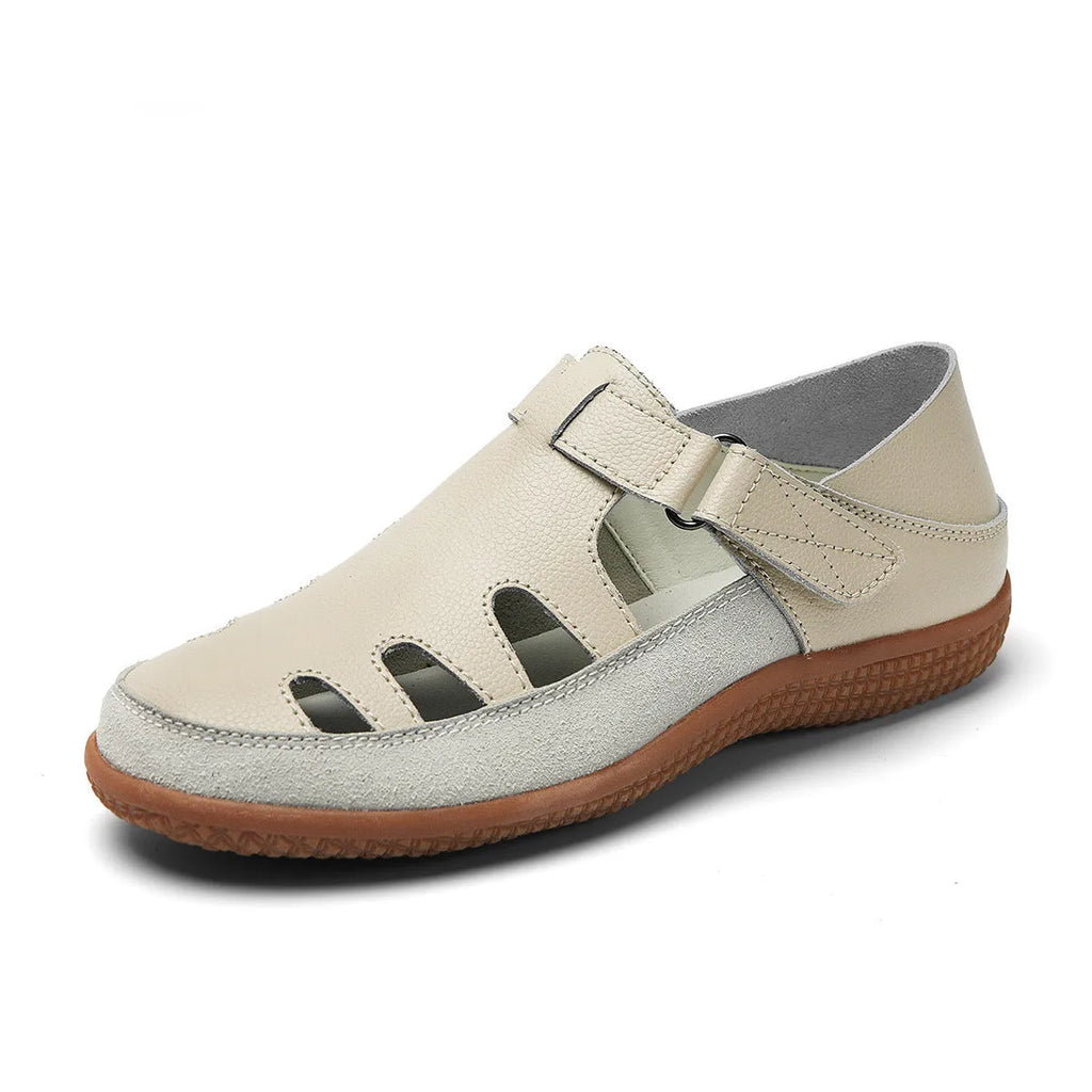 Women's plus size flat sandals with hollow-out toe cap in red, white, or blue on a thick rubber sole.