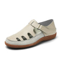 Women's plus size flat sandals with hollow-out toe cap in red, white, or blue on a thick rubber sole.