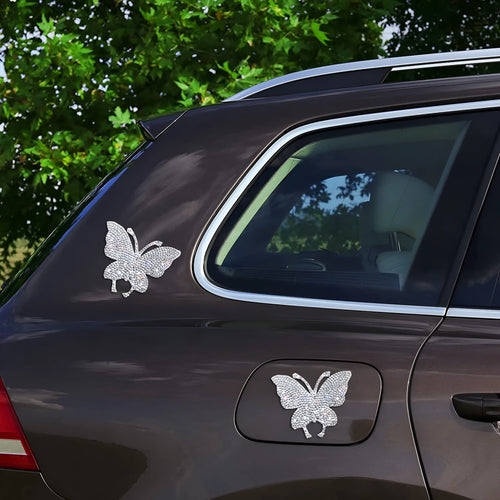 Diamond-encrusted glass car sticker showing butterfly and bear paw designs, scale next to a 7x6 cm measurement.