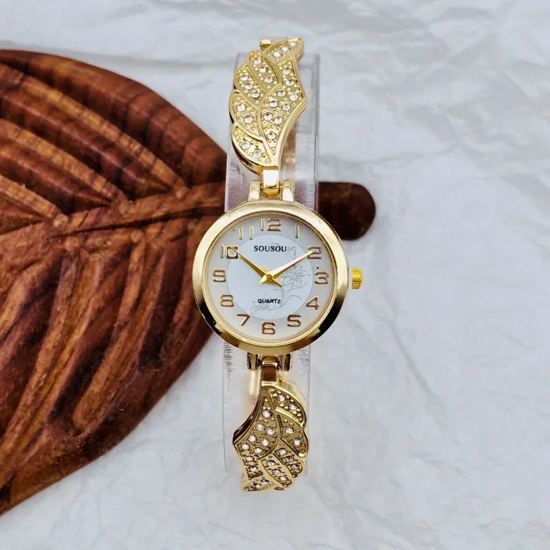 Women's stainless steel watch with round dial showing gold surface option and vachette clasp buckle