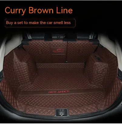 Mitsubishi Outlander custom boot liner with 3D raised edges and non-slip surface in a vehicle boot.