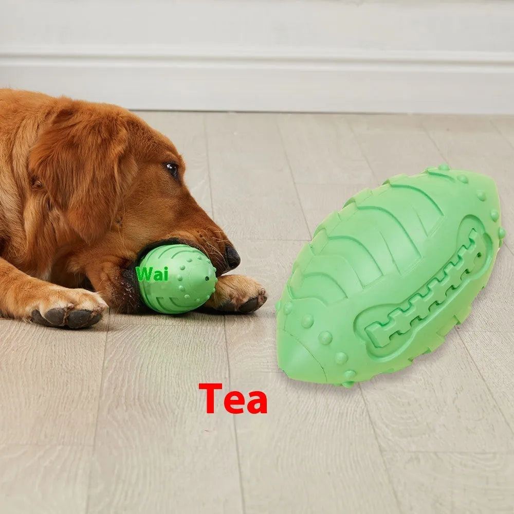Sapphire blue rugby-shaped rubber dog toy with textured surface for teeth cleaning