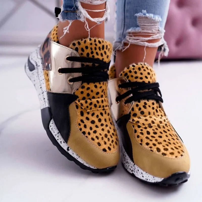 Women's casual suede sneakers with wedge heel in black, leopard, panther, pink, and snake pattern colours
