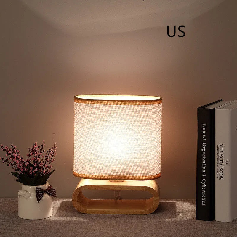 Nordic Japanese bedside table lamp with rubber wood holder, Φ170mm by H230mm, on a nightstand