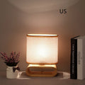 Nordic Japanese bedside table lamp with rubber wood holder, Φ170mm by H230mm, on a nightstand