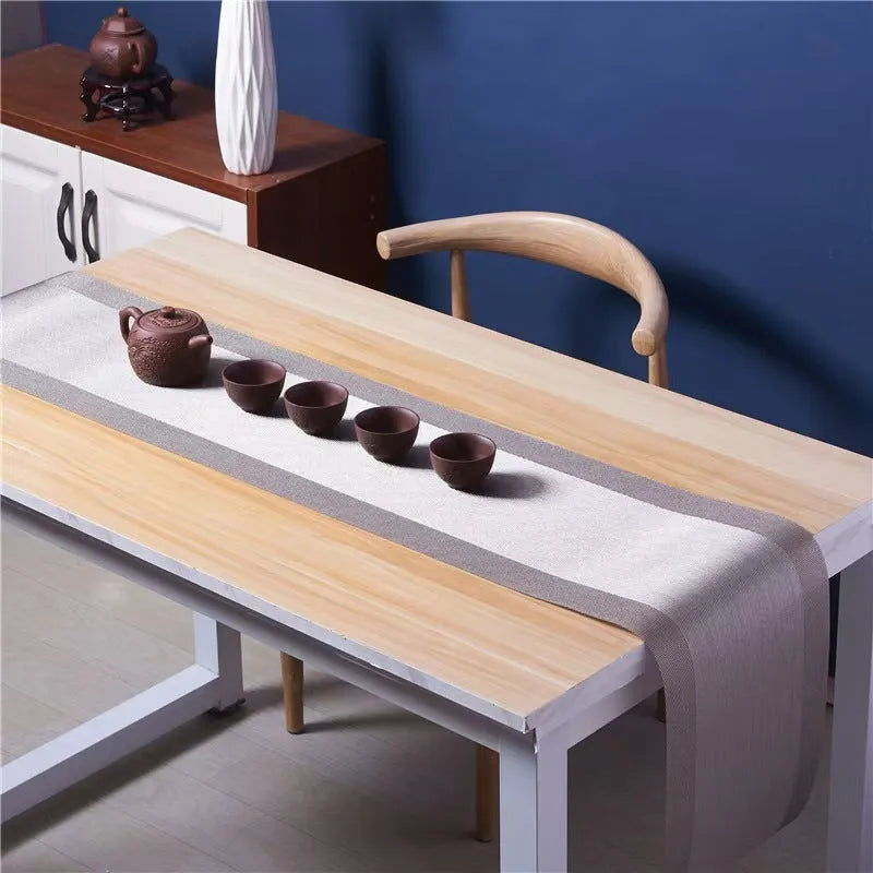 Modern PVC kitchen sink mat in a gradient bamboo colour on a countertop, showing its non-slip texture and size.