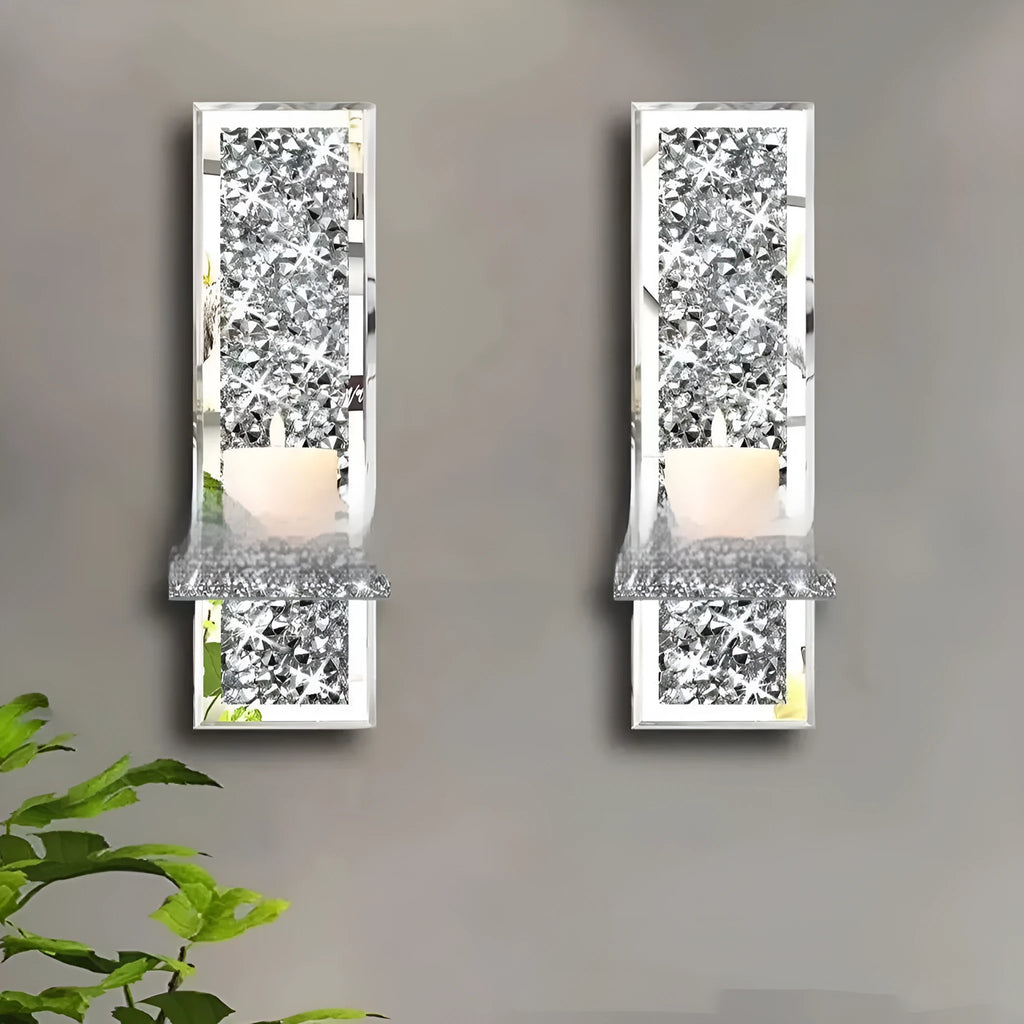 Pair of modern silver mirror glass wall-mounted candle holders, 38cm tall.