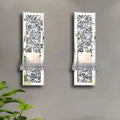 Pair of modern silver mirror glass wall-mounted candle holders, 38cm tall.
