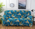 Geometric print polyester sofa slipcover stretched over sofa with matching pillowcase