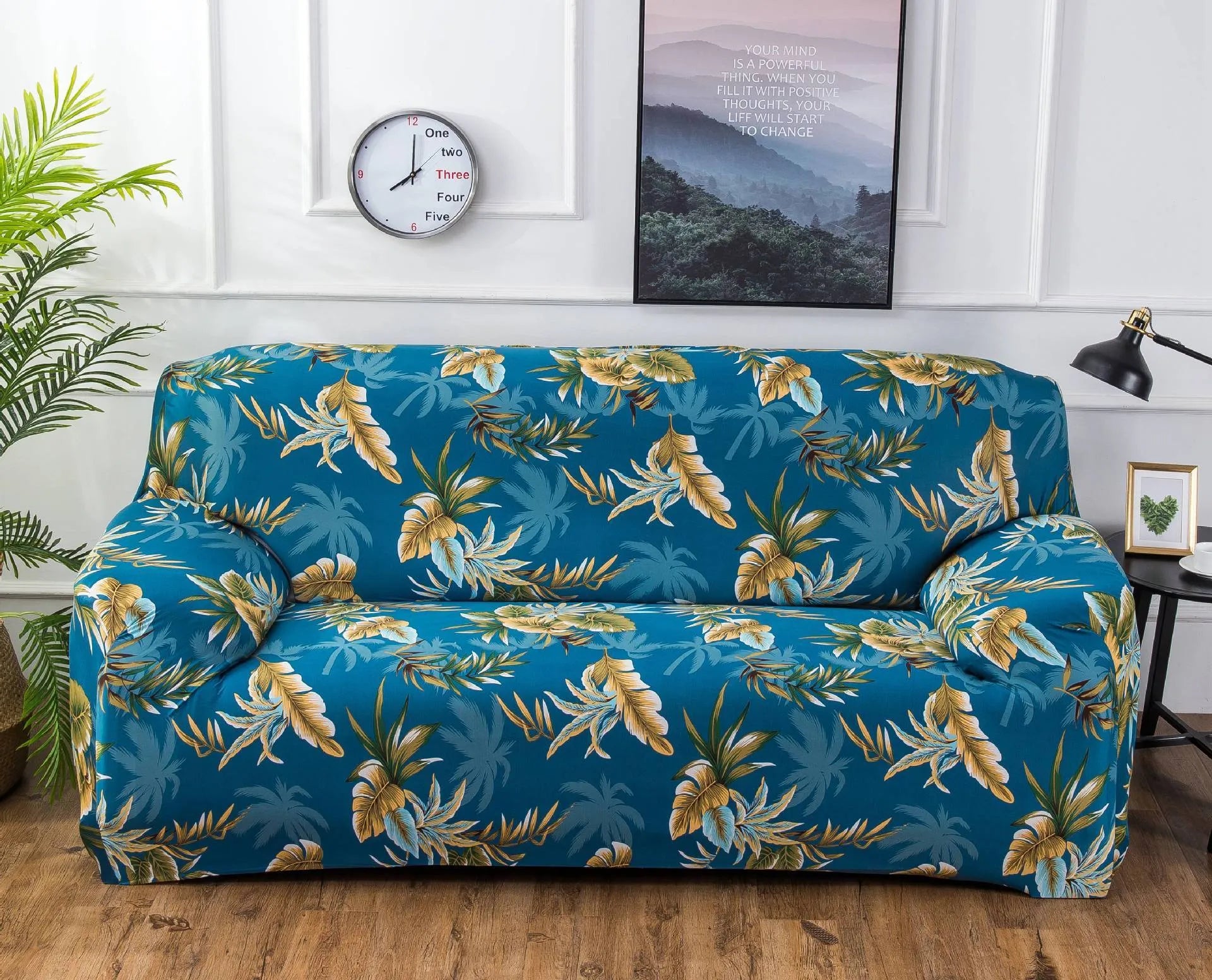 Geometric print polyester sofa slipcover stretched over sofa with matching pillowcase