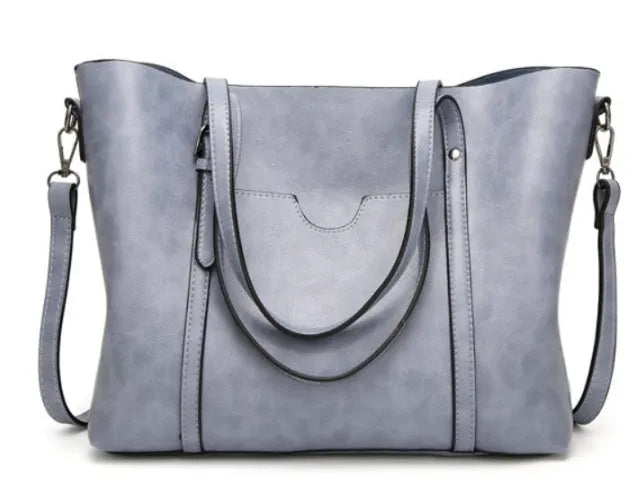 Retro messenger bag for women in PU leather with large A4 capacity and shoulder strap
