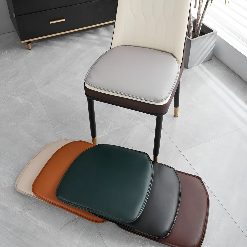 Horseshoe-shaped PU leather seat cushion in orange, shown on a chair.