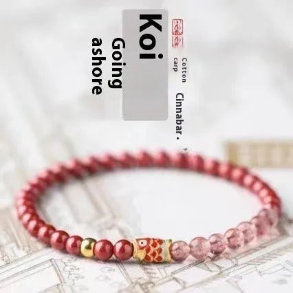 Close-up of a women's purple cinnabar and strawberry quartz lucky bead bracelet in a retro style.