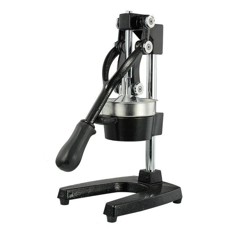 Black cast iron manual citrus juicer with stainless steel cone on a white background.