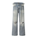 Men's blue straight-leg jeans with ripped details and zipper fly in retro style