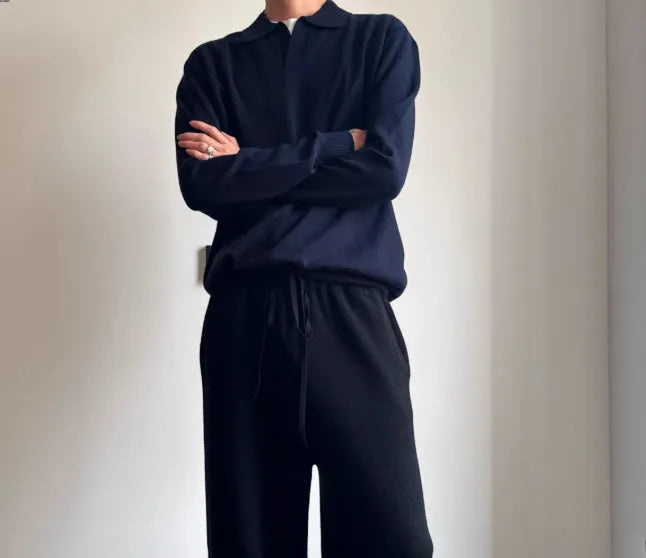 Pure wool polo sweater with lapel collar in loose fit, shown in milky white.
