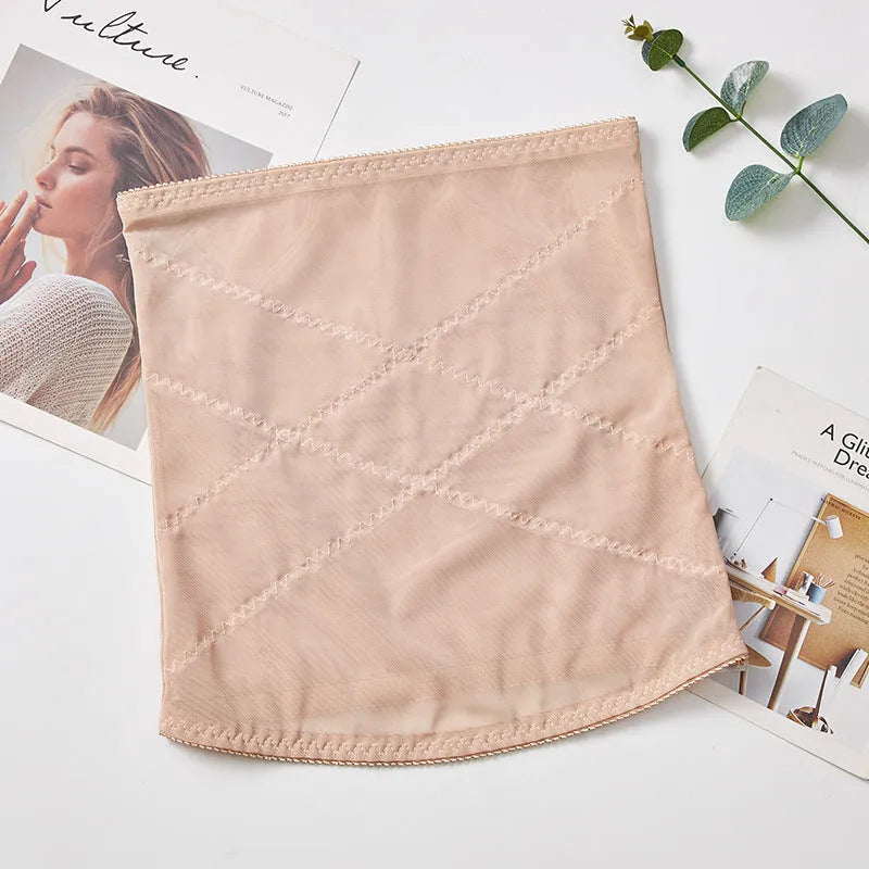Mesh postpartum belly band in black with adjustable strap and cross waistband design