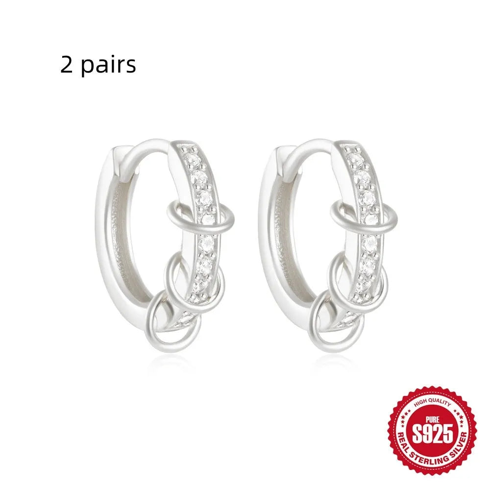 Sterling silver geometric stud earrings with diamond detailing in gold or silver finish