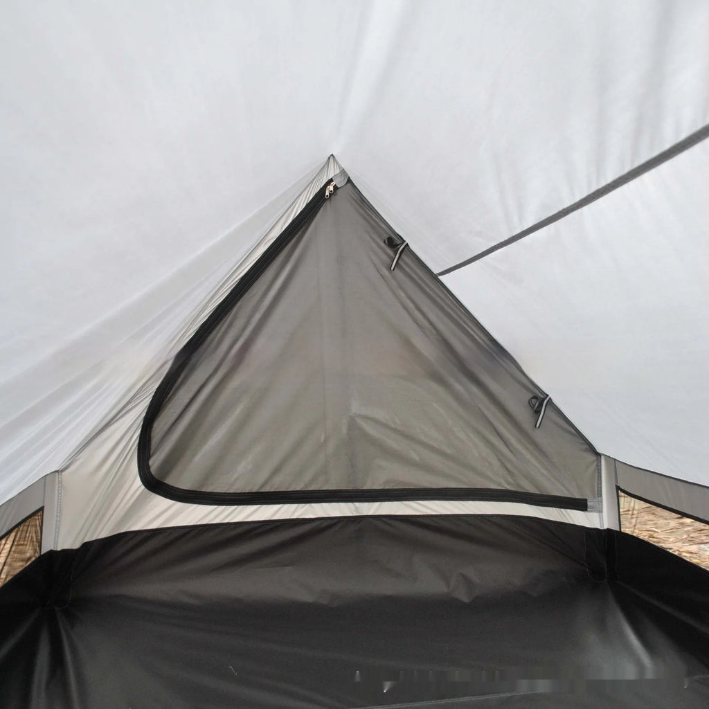 Brown or white A-line hiking tent without poles, supported by hiking canes