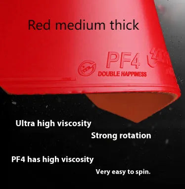 Fast Attack Sticky Classic-50 table tennis racket with red PF4-50 anti-rubber on a wooden table.