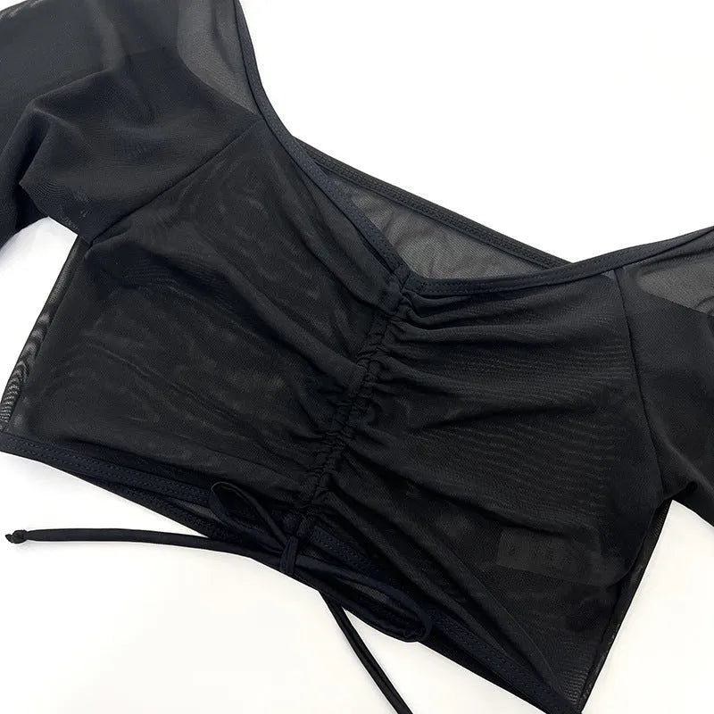Black mesh bikini four-piece suit with long sleeves and briefs for women's swimming