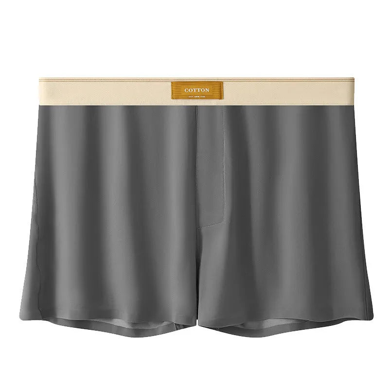 Pack of three pairs of men's solid colour ice silk underwear on a white background.