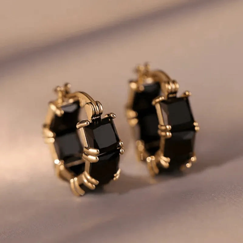 Geometric U-shaped gold electroplated copper ear rings with round black zircon settings