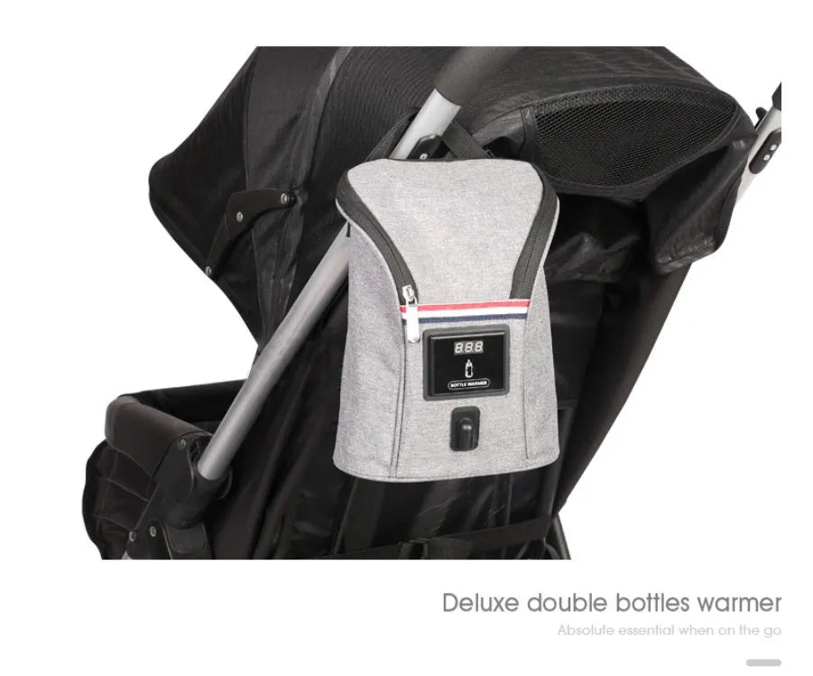 Grey portable baby bottle warmer with digital display for car travel use