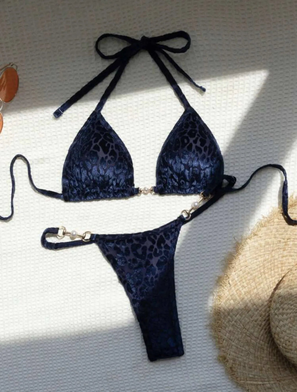 Women's leopard print swimsuit bikini in blue on yellow background