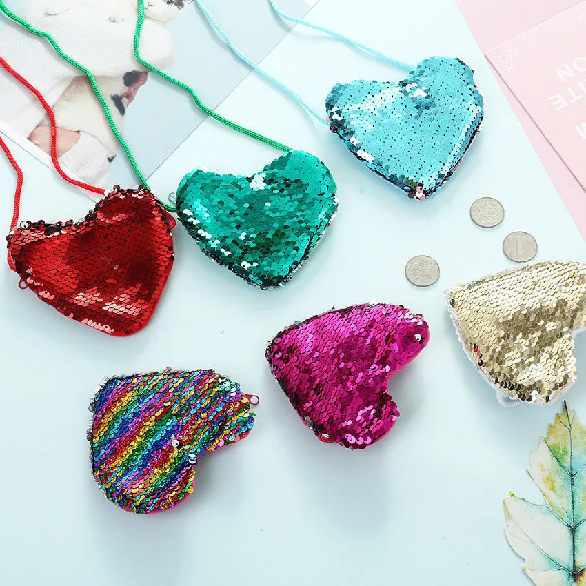 Sequined heart-shaped crossbody purse in gold with lanyard strap