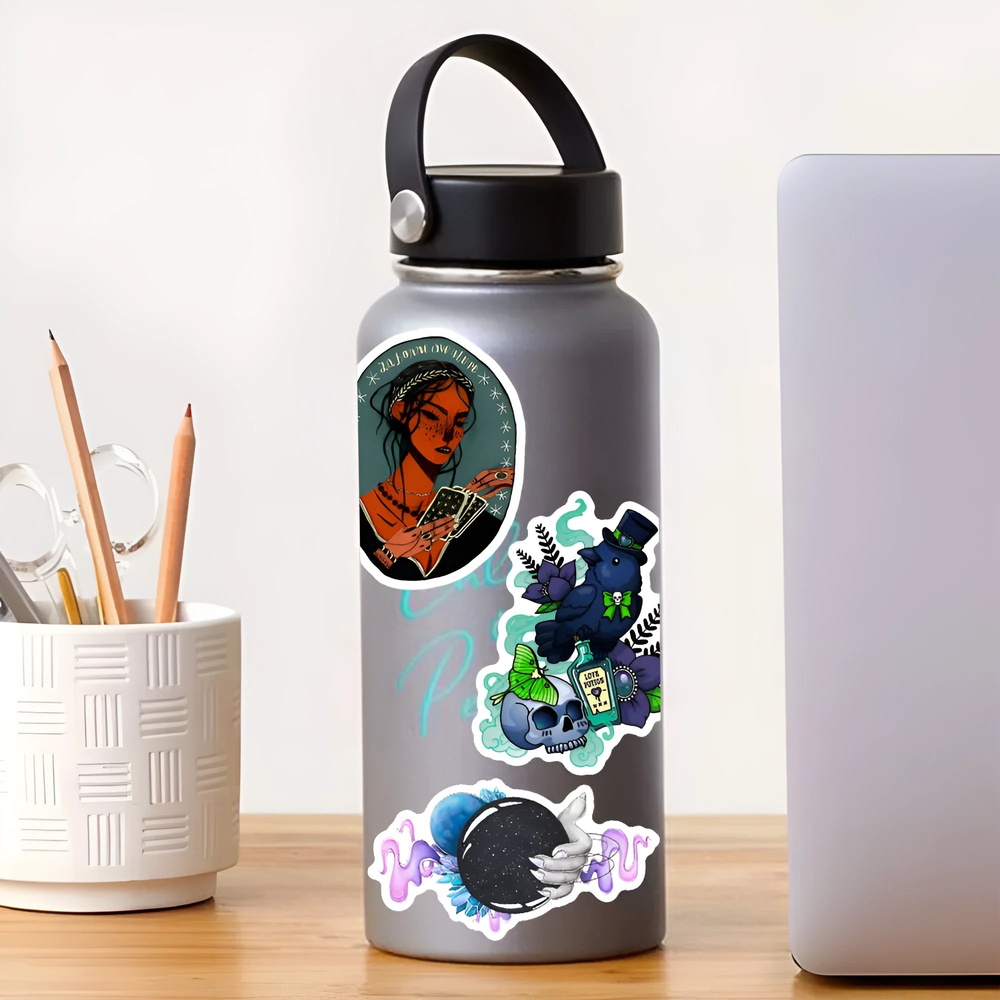 Assorted waterproof PVC stickers in sizes from 3cm to 8cm for laptops and skateboards.