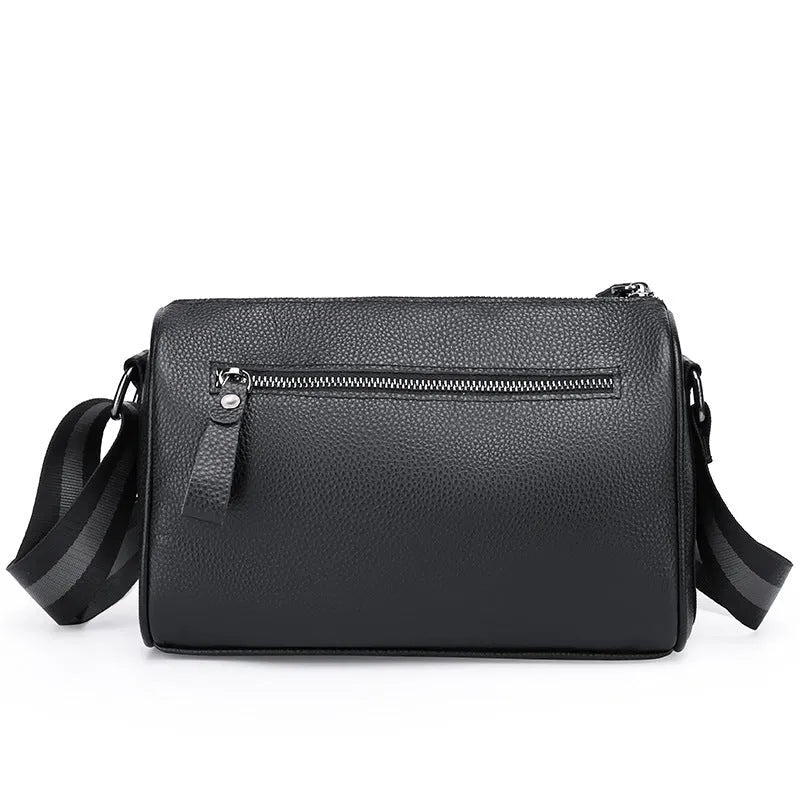 Black genuine leather one-shoulder crossbody bag showing front and side view.
