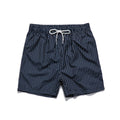Navy blue and grey striped beach shorts with a straight leg opening on a mannequin.