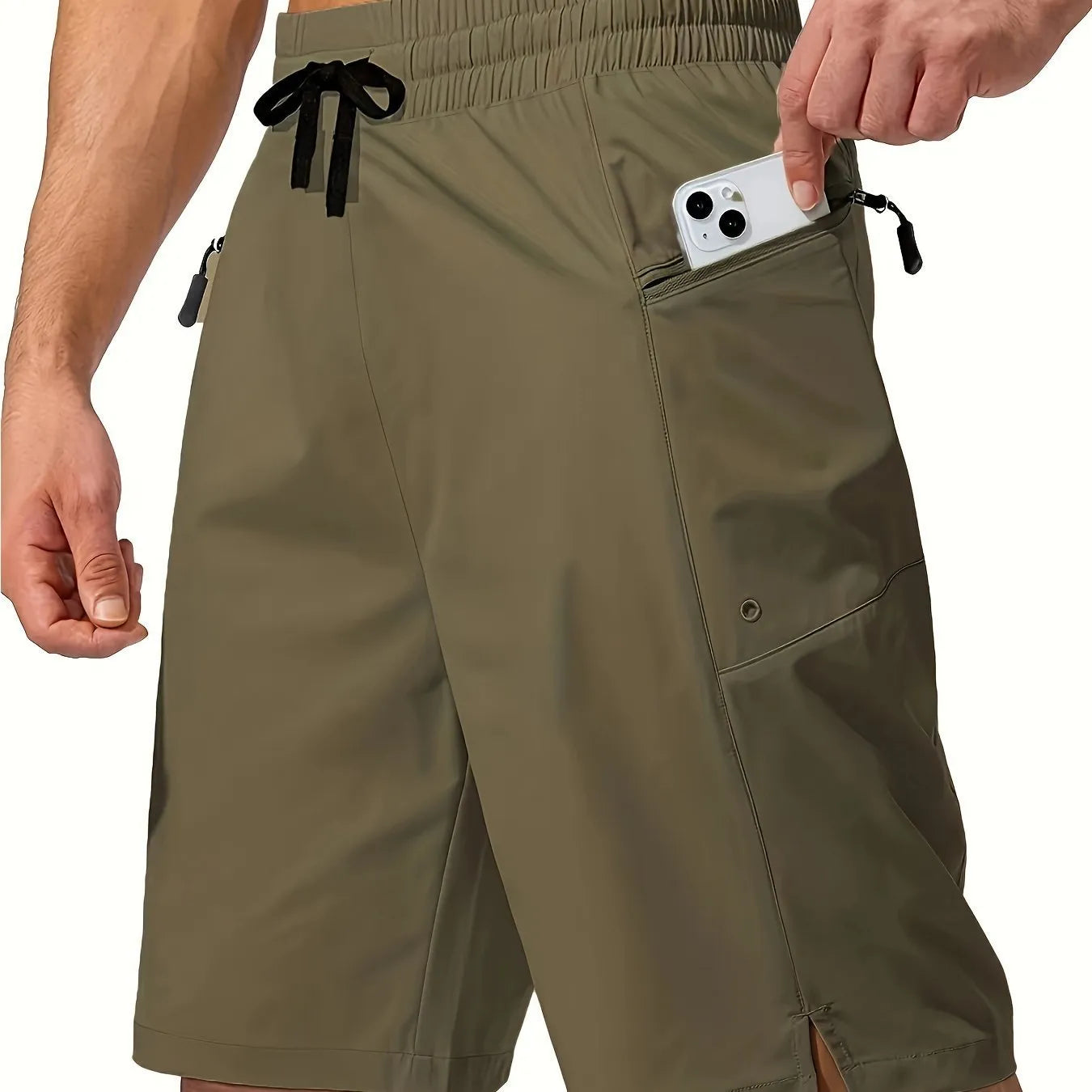 Man wearing straight cut quick-dry polyester beach shorts in a solid colour.