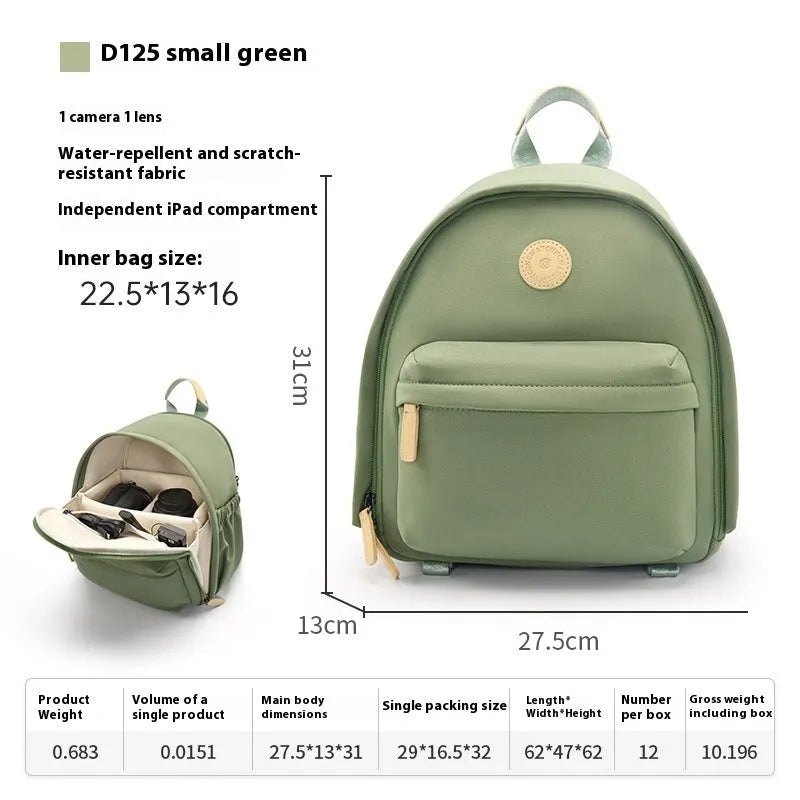 Women's polyester shoulder camera bag in black with a curved strap and detachable iPad pocket.