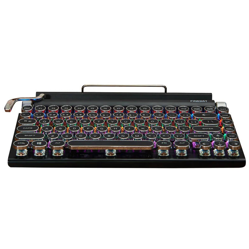 Black retro typewriter style mechanical keyboard with backlit keys on a desk