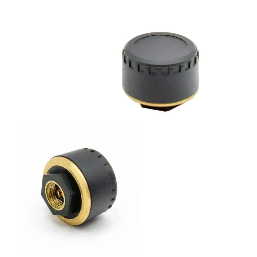 Four black Bluetooth tyre pressure monitors for car with mobile phone display showing pressure readings