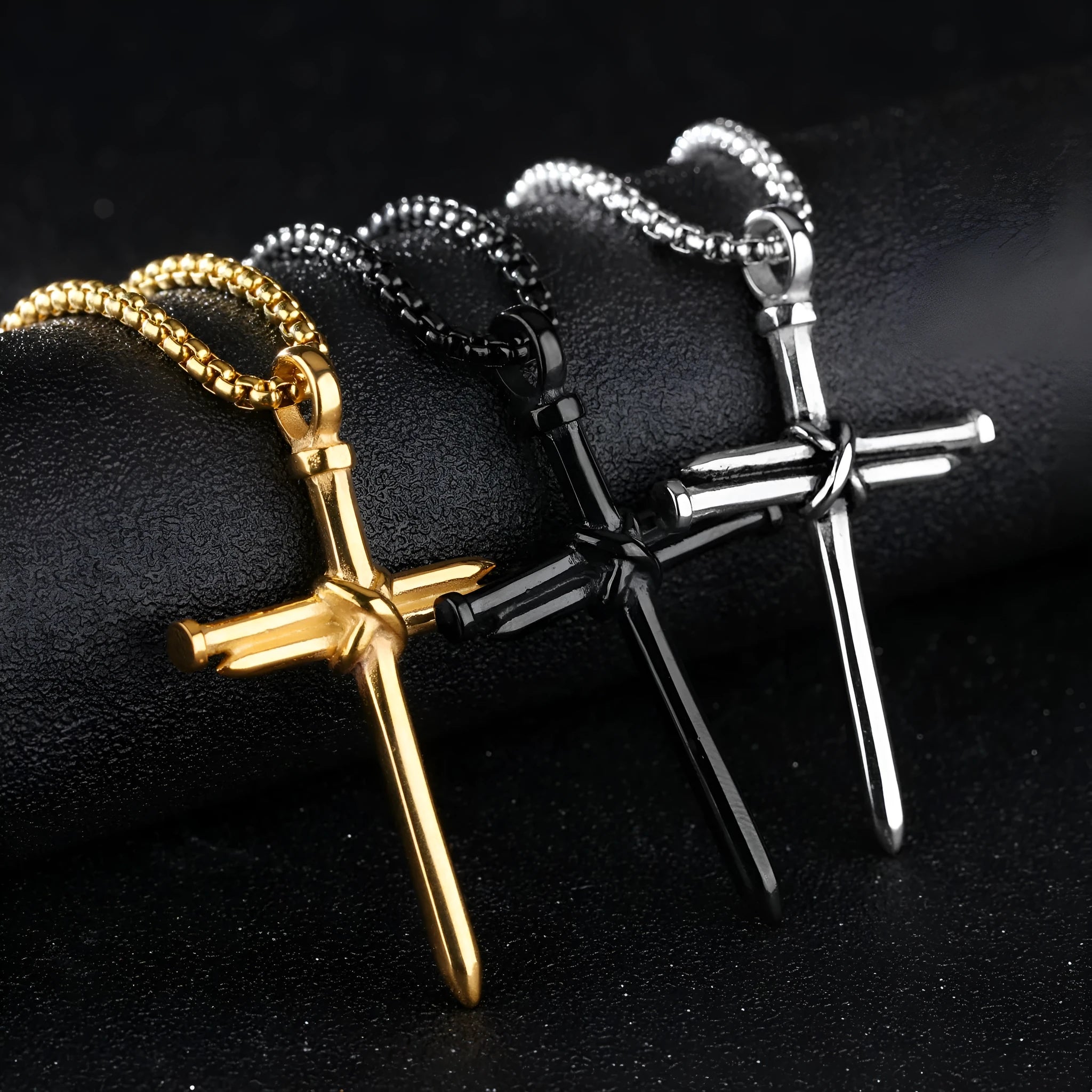 Titanium steel cross pendant necklace with steel nails motif, available in black golden silver colours