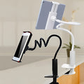 Black flexible tablet mount holder with suction base showing 360-degree rotating clamp