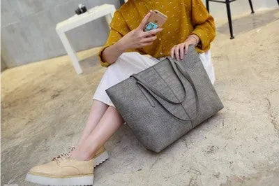 Simple fashion shoulder bag handbag in black or grey colour for spring and summer use