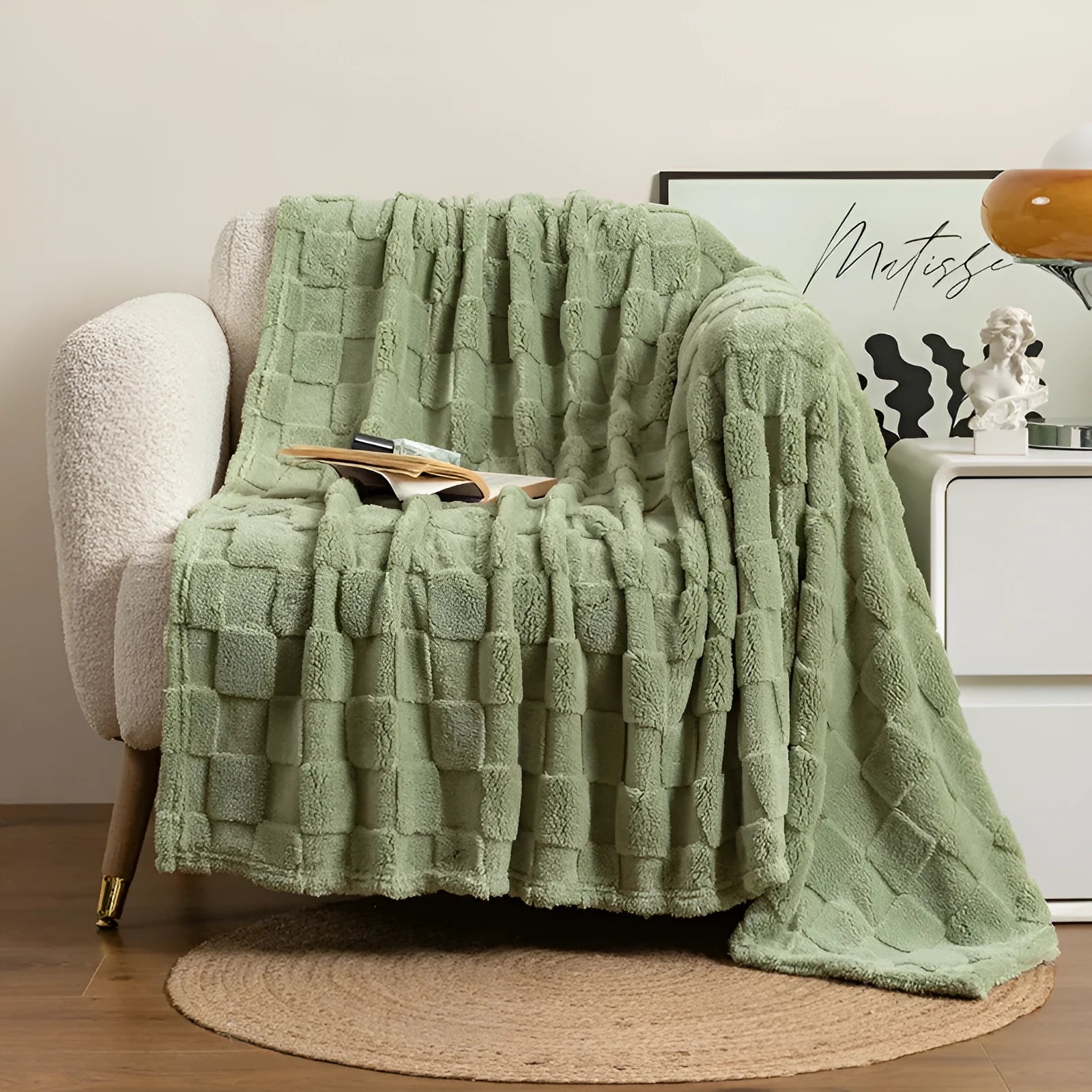 Geometric pattern polyester blanket in milky white colour showing thickened texture