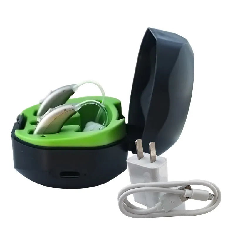 Invisible wireless hearing aid and its USB charging case on a table.
