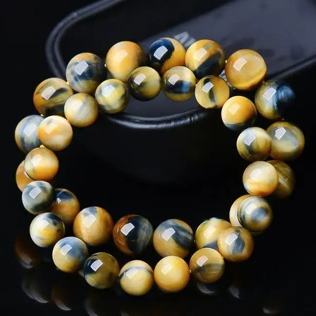 Fantasy tiger eye agate bracelet with geometric round beads in a unisex single circle design.