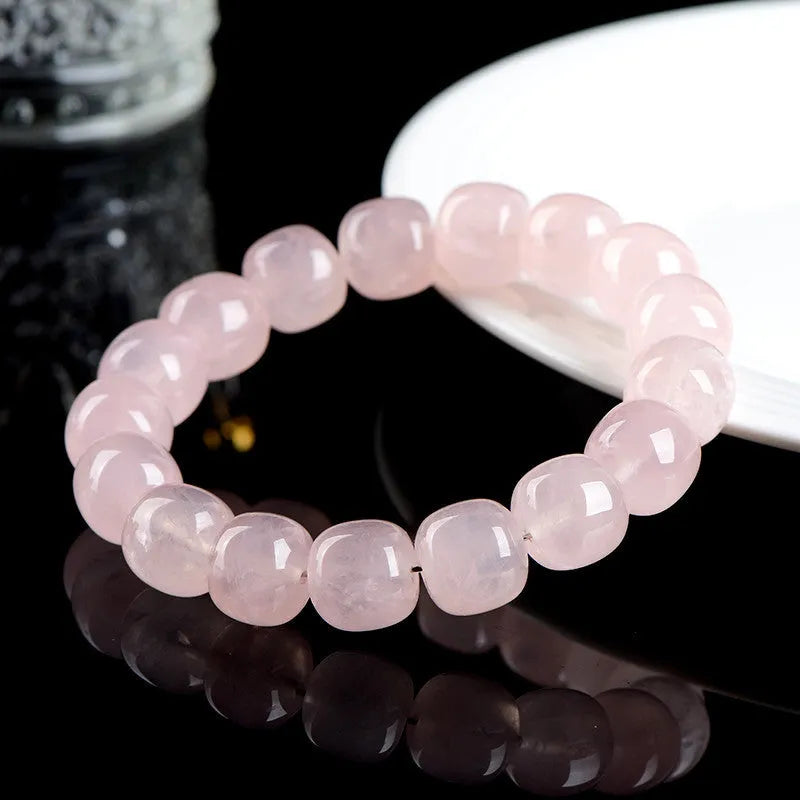 Pink bracelet with geometric barrel beads made from natural bamboo crystal measuring 11 * 12mm